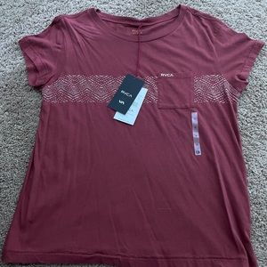 Burgundy tee shirt.